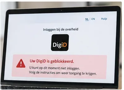 Laptop waarop een DigiD-blokkademelding staat, gebruikt als voorbeeld om de exacte melding te controleren