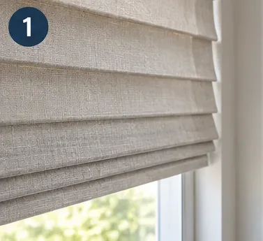 Beige fabric blinds hanging at a window before cleaning, shown with a numbered step marker