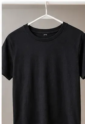 Clean black T-shirt hanging on a hanger to air-dry after deodorant stain treatment