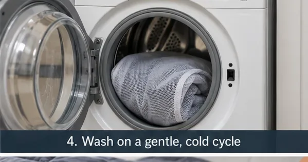 Gray weighted blanket loaded by itself in the drum of a front-loading washing machine.