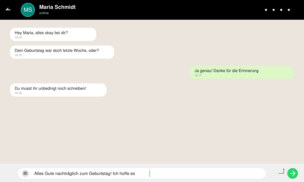 Nahaufnahme des WhatsApp-Chats mit dem Cursor im Textfeld und einem halb fertigen Geburtstagsgruß