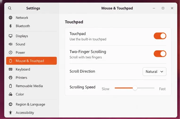 Ubuntu Settings is open to Mouse & Touchpad, showing the Touchpad and Two-Finger Scrolling switches turned on.