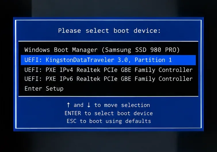 UEFI boot menu showing a highlighted Kingston USB entry below Windows Boot Manager