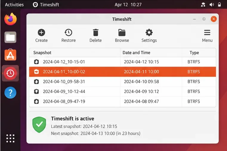 قائمة لقطات Timeshift مع نقاط استعادة BTRFS المؤرخة وإدخال واحد محدد.